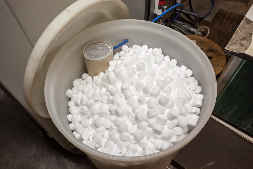 Water softener sodium beads in the tank